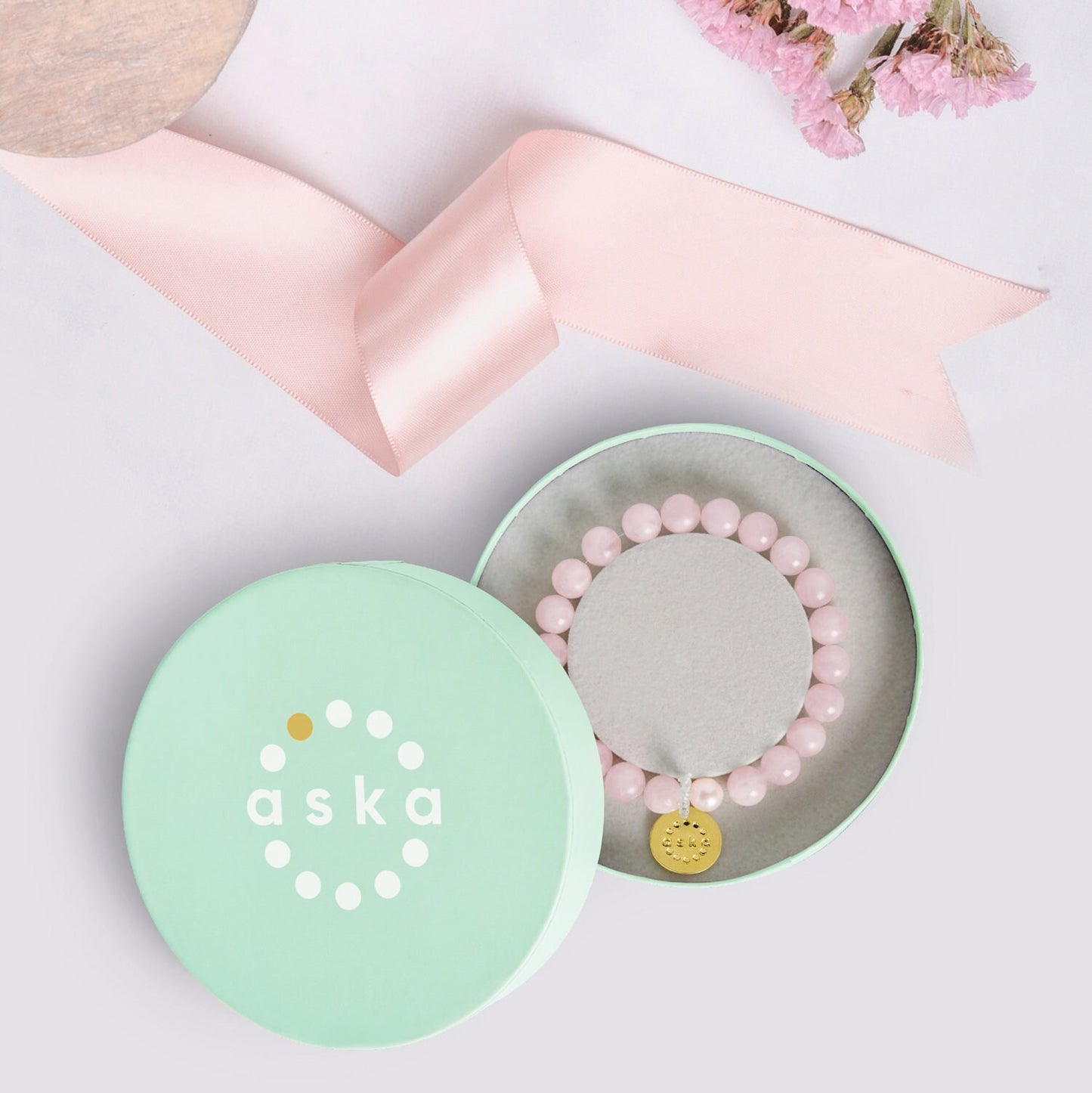 Aska Maternity Movement Bracelet in rosequartz with gold plated sterling silver pendant and premium gift box